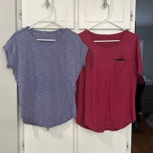 lot of 2 lululemon shirts similar to a crew neck